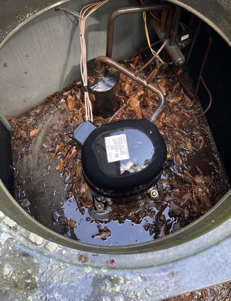 Dirty, grime-covered HVAC condenser coil before Barfield's Heating & Air cleaned it