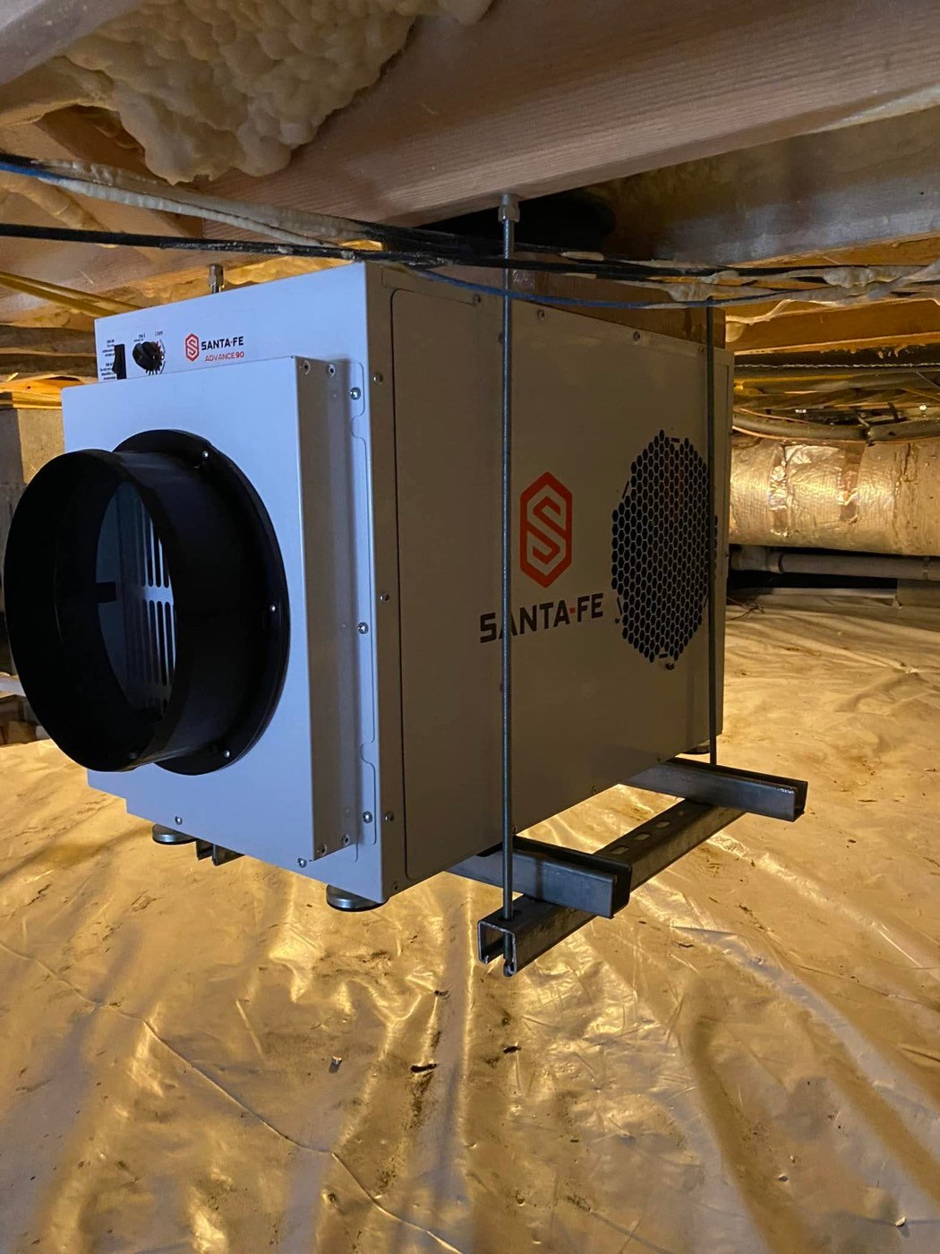 Santa Fe dehumidifier installed in a home crawlspace for indoor air quality